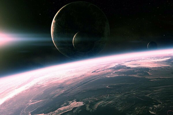 The moon above the earth in outer space