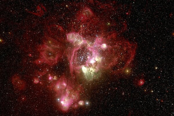 Red nebula visible through a telescope