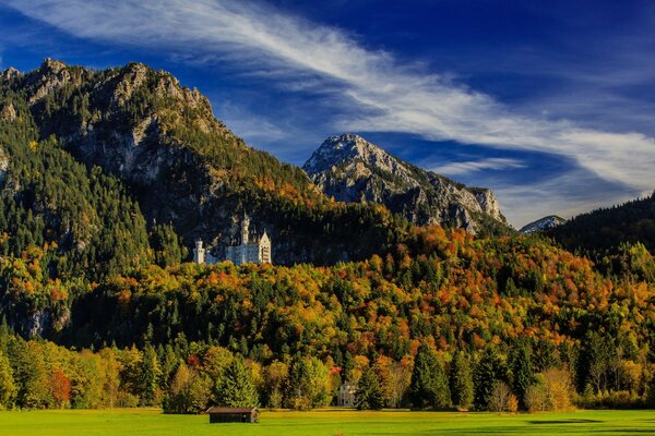 CASTLE IN THE FOREST IN THE MOUNTAINS OF BAVARIA