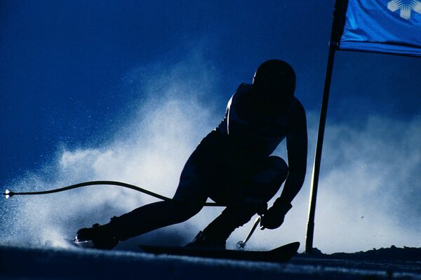 Sport. Silhouette eines Mannes auf einem Ski