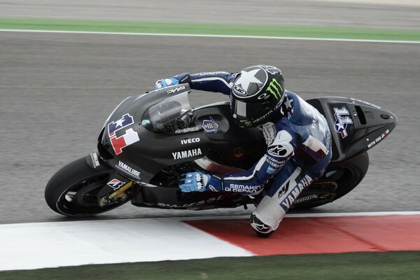 A steep turn on a motorcycle