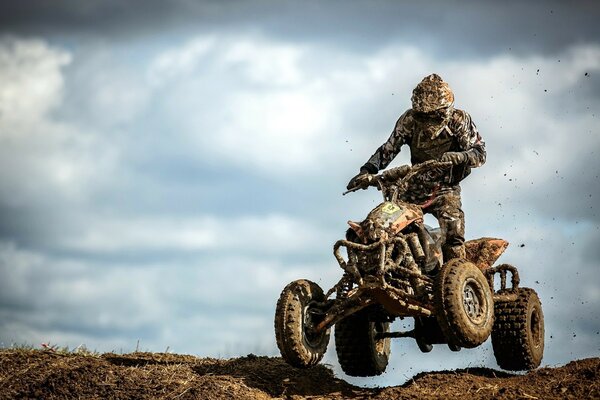 Sports dirt race on quad bikes