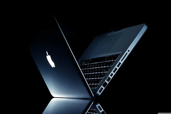 Apple laptop stands at an angle