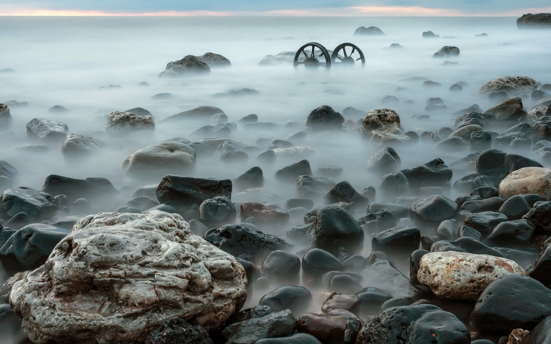 coast sea stones fog