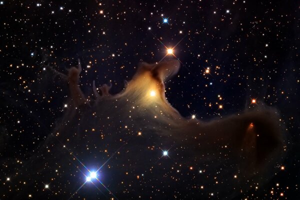 Una nube de gas rodeada de estrellas, planetas, púlsares