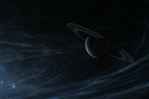 A planet in rings in space against the background of stars