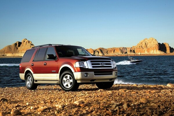 Off-road vehicle on the seashore