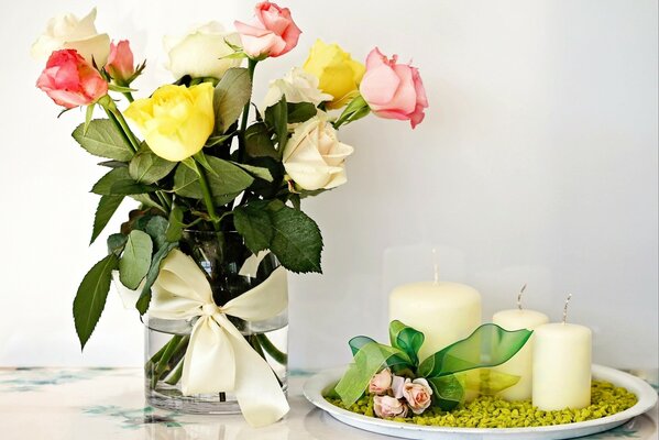 Beautiful bouquet of roses in a vase on the table