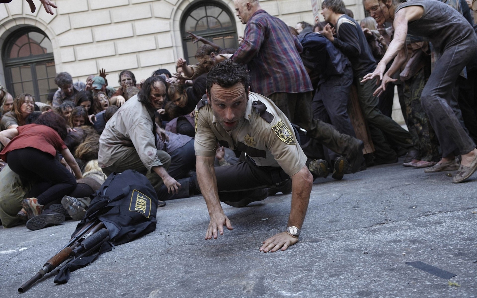 eries andrew lincoln zombie crowd rick grimes serial return of the hero actor the walking dead