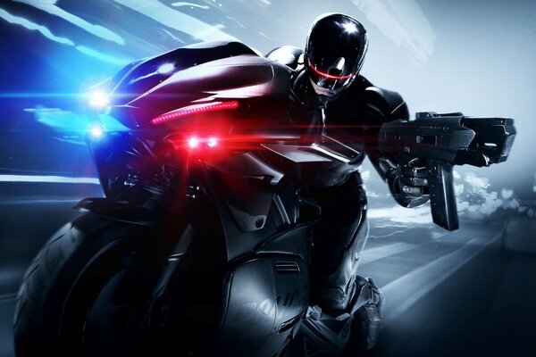 Robocop on a motorcycle with a gun in his hands