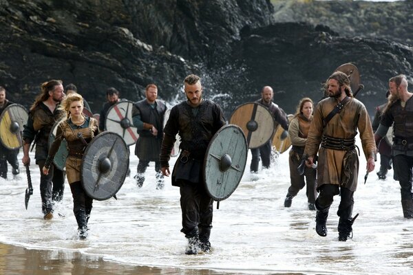 Clipping from the TV series Vikings walk along the seashore