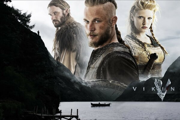 Three Vikings from the TV series against the sky