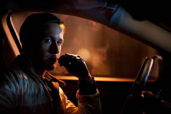 Ryan Gosling driving a car