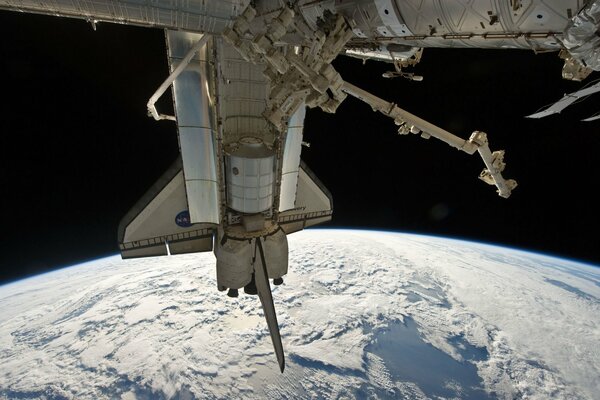 Espacio de acoplamiento del transbordador espacial planeta tierra