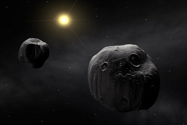 A pair of meteorites on the outskirts of the solar system