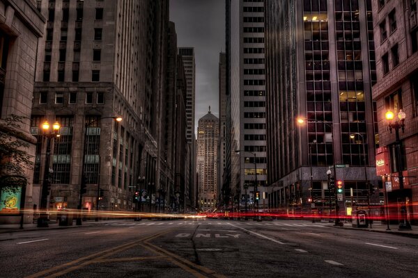 An empty street among skyscrapers