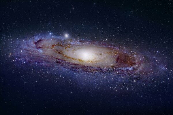 Andromeda galaxy surrounded by stars and planets