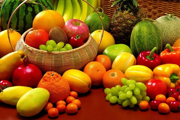 Delicious fruits on the red table