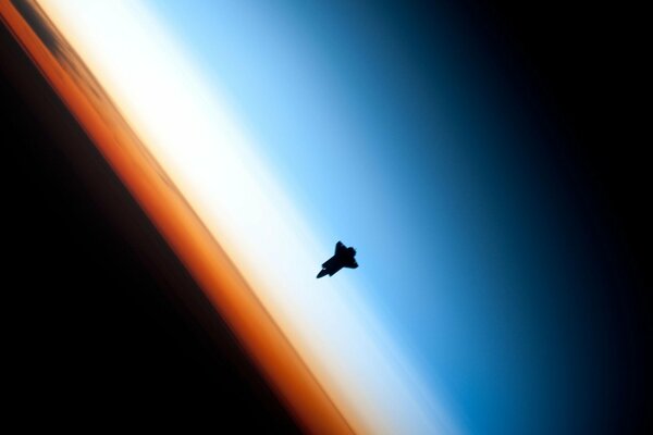 A shuttle in orbit near Earth