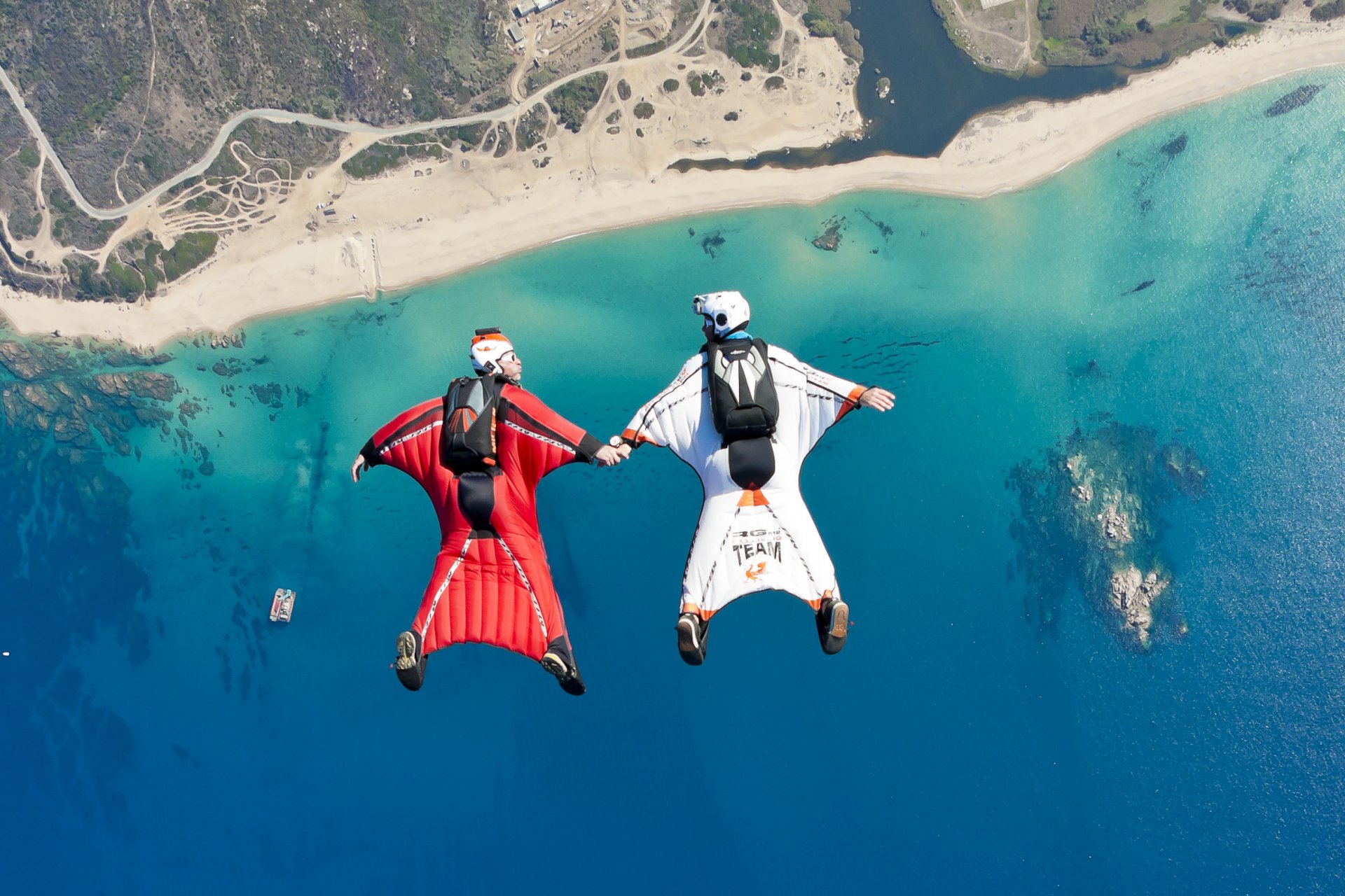 wingsuit formation fs beach sea boat reef river helmet trailers parachute extreme sport