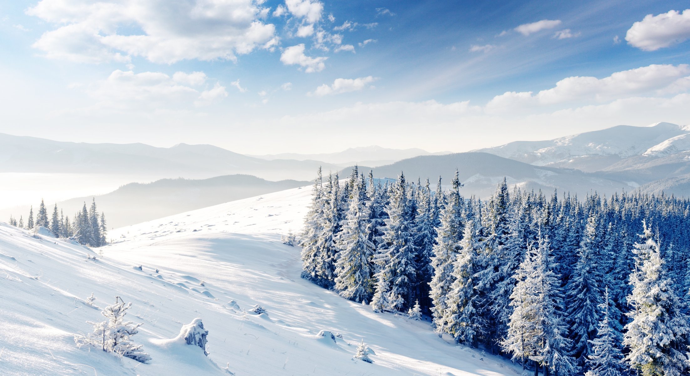 hills snow clouds tree winter