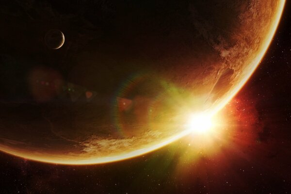 The sun is coming out brightly from behind the planet