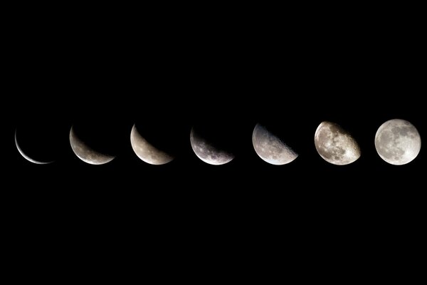 Fasi di crescita della Luna dalla luna nuova alla luna piena su sfondo nero