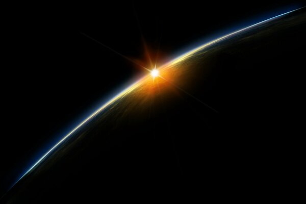 Красивое изображение солнце на горизонте с планетой