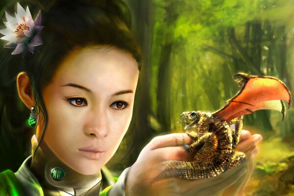 Asiatische Frau in der Hand mit einem kleinen Drachen