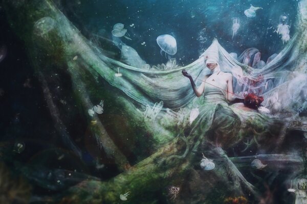 Podwodny świat fantasy z żywą dziewczyną i meduzami