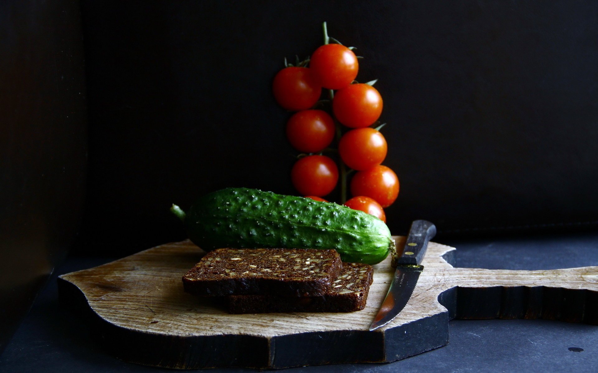 food bread tomatoes knife cucumber