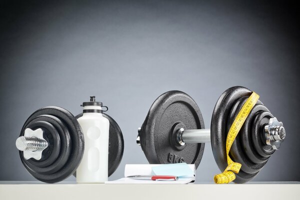 Fitness attributes: dumbbells, sports drinks