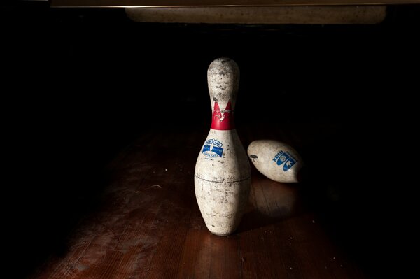 Bowling pins on a dark background