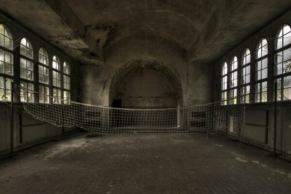 An old abandoned sports hall for volleyball