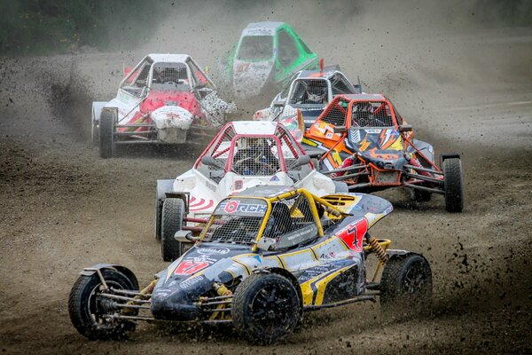 Race cars on a sandy track