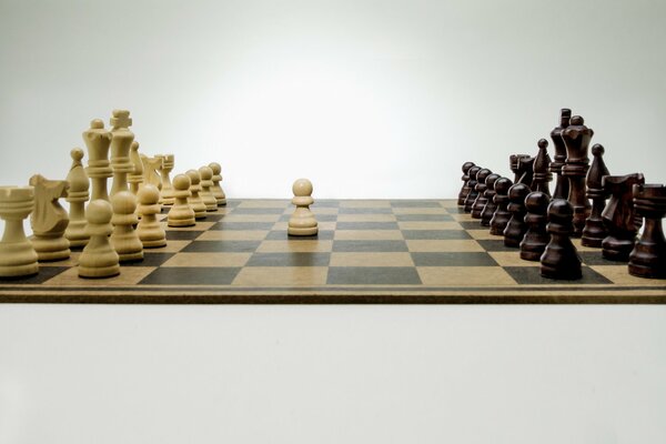 Black and white pieces on a chessboard