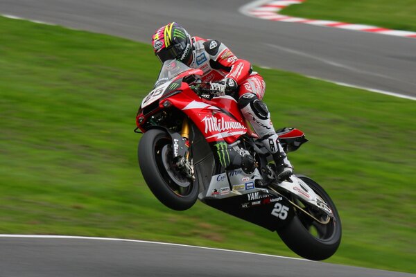 Famous motorcyclist on a red bike