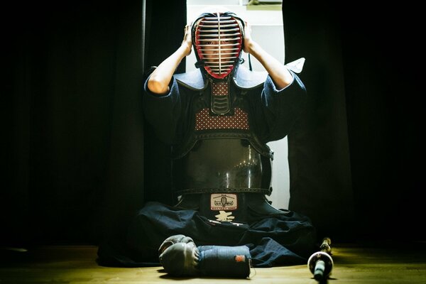 A girl in uniform for martial arts classes