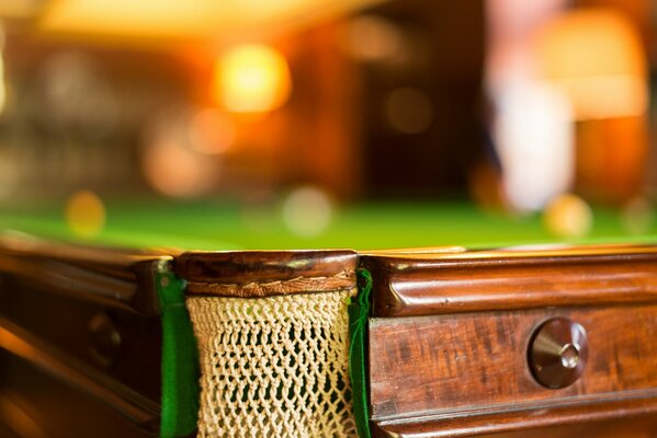 Brown sports table with pocket