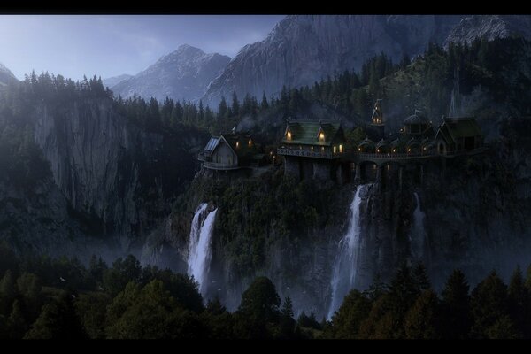 Maison dans les montagnes au-dessus d une cascade