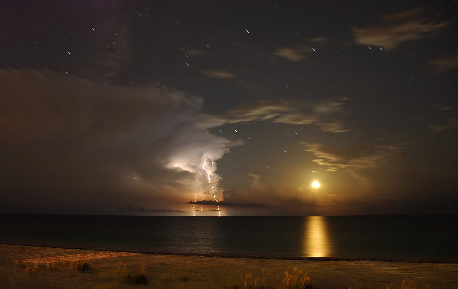 the moon gulf of mexico anna maria island lightning fl