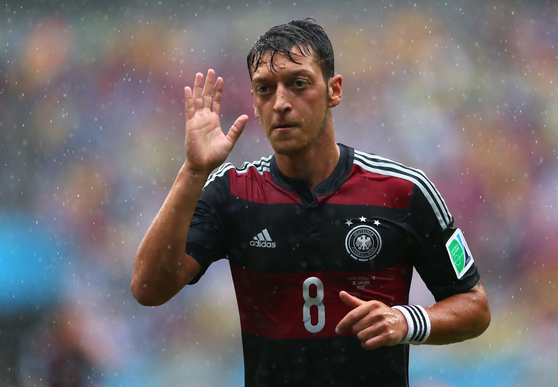 mesut ozil germany fifa fifa footballer player football sport world cup 2014 world cup 2014 brazil rain downpour