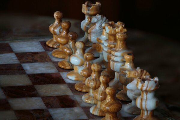 Marble chess pieces on the board