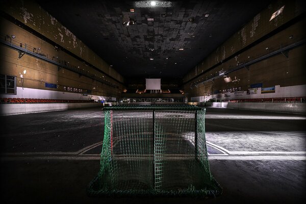 Green gates in the gym without lights