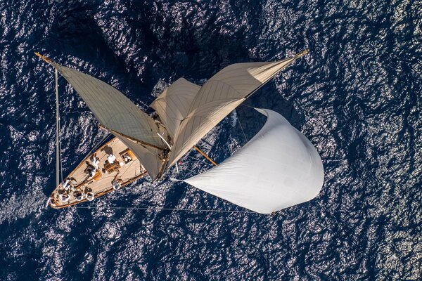 Photo of a yacht in the ocean from a height