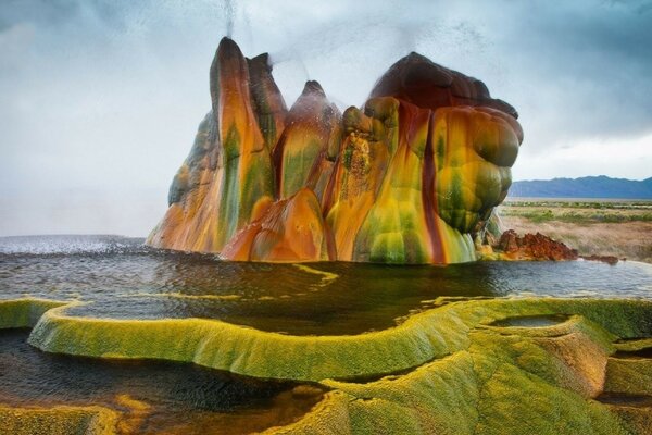 A colored mountain in a water pool