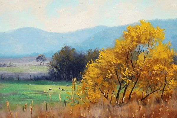 Yellow tree on the background of blue mountains