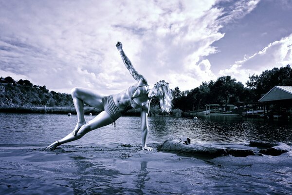 Yoga girls on the surface of the water