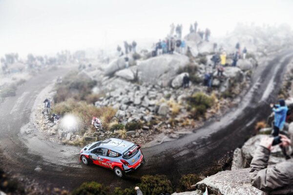 A multi-colored Hyundai car on the road. Rally Racing