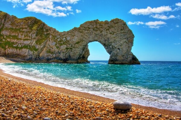 Cape of love. Arch on the sea